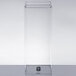 A clear acrylic chamber with a metal ring on top.