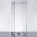 A clear acrylic box with a ring inside.