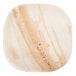 A close-up of a TreeVive by EcoChoice palm leaf plate.