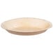 A close up of a TreeVive by EcoChoice oval palm leaf bowl.