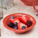 A Libbey Cantina porcelain fruit bowl filled with fruit on a marbled surface.