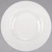 A close-up of a Libbey ivory porcelain pasta bowl with a circular design on it.