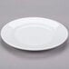 A white Libbey porcelain plate with a circular shape and a rim.