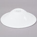 A Libbey white porcelain soup bowl on a gray background.