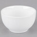 A white Libbey porcelain bouillon bowl on a gray surface.