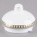 A white bone china tea pot lid with gold accents.