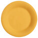 A close up of a GET Tropical Yellow wide rim melamine plate.