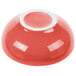 A white bowl with a red rim.