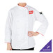 A woman wearing a Mercer Culinary white chef jacket with red piping.