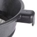 A Matfer Bourgeat Exoglass bouillon strainer with a black handle.