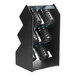 A black metal Vollrath countertop organizer with black perforated cylinders.