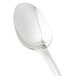 A Libbey stainless steel European teaspoon with a silver handle.