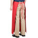 A person wearing a red Intedge bistro apron with 2 pockets.