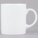 A 10 Strawberry Street Royal White porcelain mug with a C-handle.