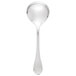 A silver spoon with a long handle.