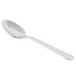 A Libbey stainless steel teaspoon with a long silver handle.