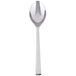 A Libbey stainless steel dessert spoon with a white handle and a silver spoon.