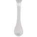 A Reserve by Libbey stainless steel dessert spoon with a Baroque handle.