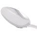 A Libbey stainless steel serving spoon with a white handle.