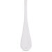 A Libbey stainless steel serving spoon with a long handle.