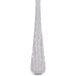 A Libbey stainless steel dinner fork with a white background.