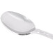 A close-up of a Libbey stainless steel iced tea spoon with a handle.