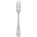 A Libbey stainless steel dinner fork with a silver handle.