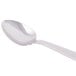 A Libbey stainless steel dessert spoon with a silver handle.