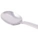 A Libbey stainless steel bouillon spoon with a silver handle.