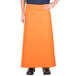 An orange Intedge bistro apron with pockets.