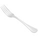 A silver Libbey stainless steel European dinner fork with a white handle.