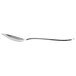 A Libbey stainless steel teaspoon with a long handle on a white background.