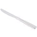 A Libbey stainless steel dinner knife with a white background.