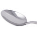 A Libbey stainless steel dessert spoon with a silver handle.