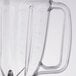 A clear plastic Waring blender jar with handle.