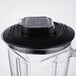 A Waring Copolyester blender jar with a lid on it.