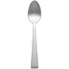 A silver Libbey Conde demitasse spoon.