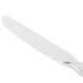A silver knife with a white handle.
