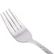 A Libbey stainless steel dinner fork with a silver handle.