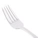 A close-up of a Libbey Contempra salad fork with a silver handle.
