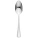 A Libbey stainless steel serving spoon with a silver handle.