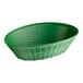 A green plastic oval serving basket with a handle.