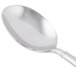 A Libbey stainless steel bouillon spoon with a silver handle.