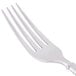 A Libbey stainless steel dinner fork with a silver handle.