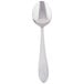 A silver Libbey dessert spoon with a curved design on a white background.