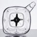 A clear plastic Waring bar blender container with a black blade.