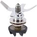 A Waring blending assembly with a metal blade on a screw.