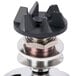 A close up of a Waring blending assembly with metal and black parts.