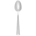 A Libbey stainless steel dessert spoon with a silver handle.