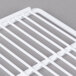 A white coated wire shelf grid.